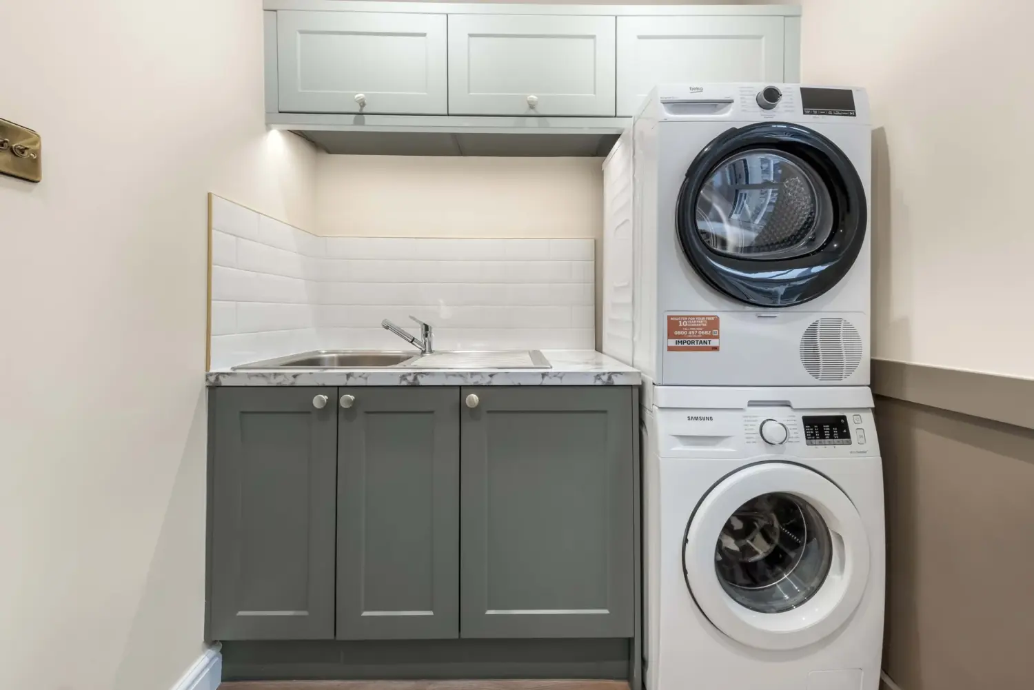 Utility cabinetry and laundry appliances