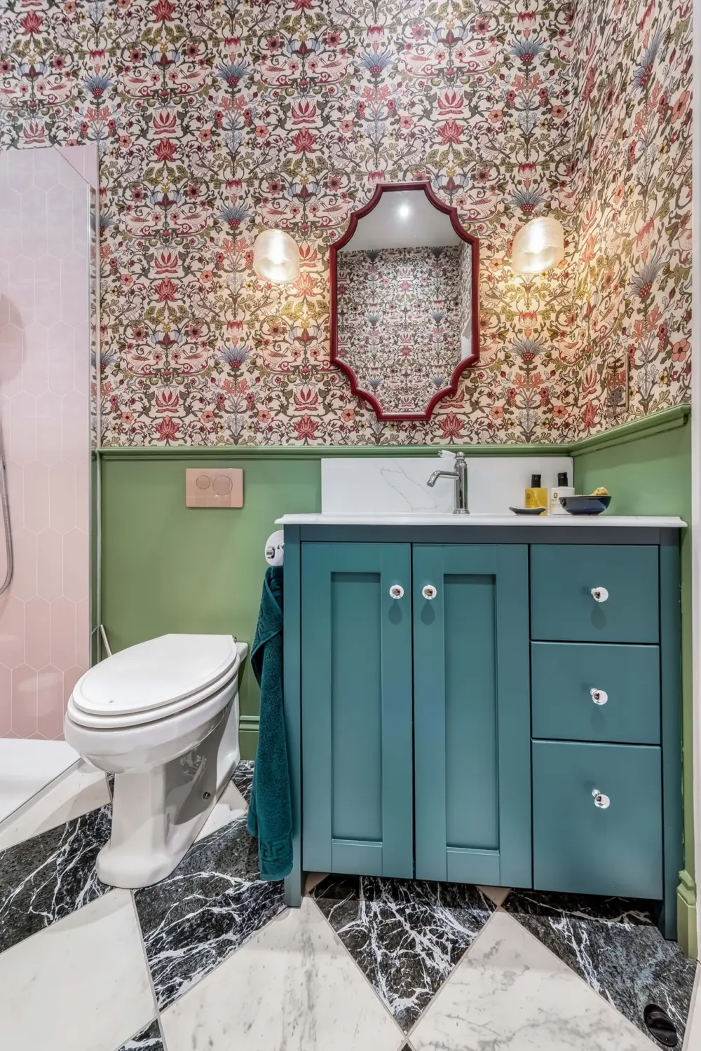 Green vanity and pink shower enclosure